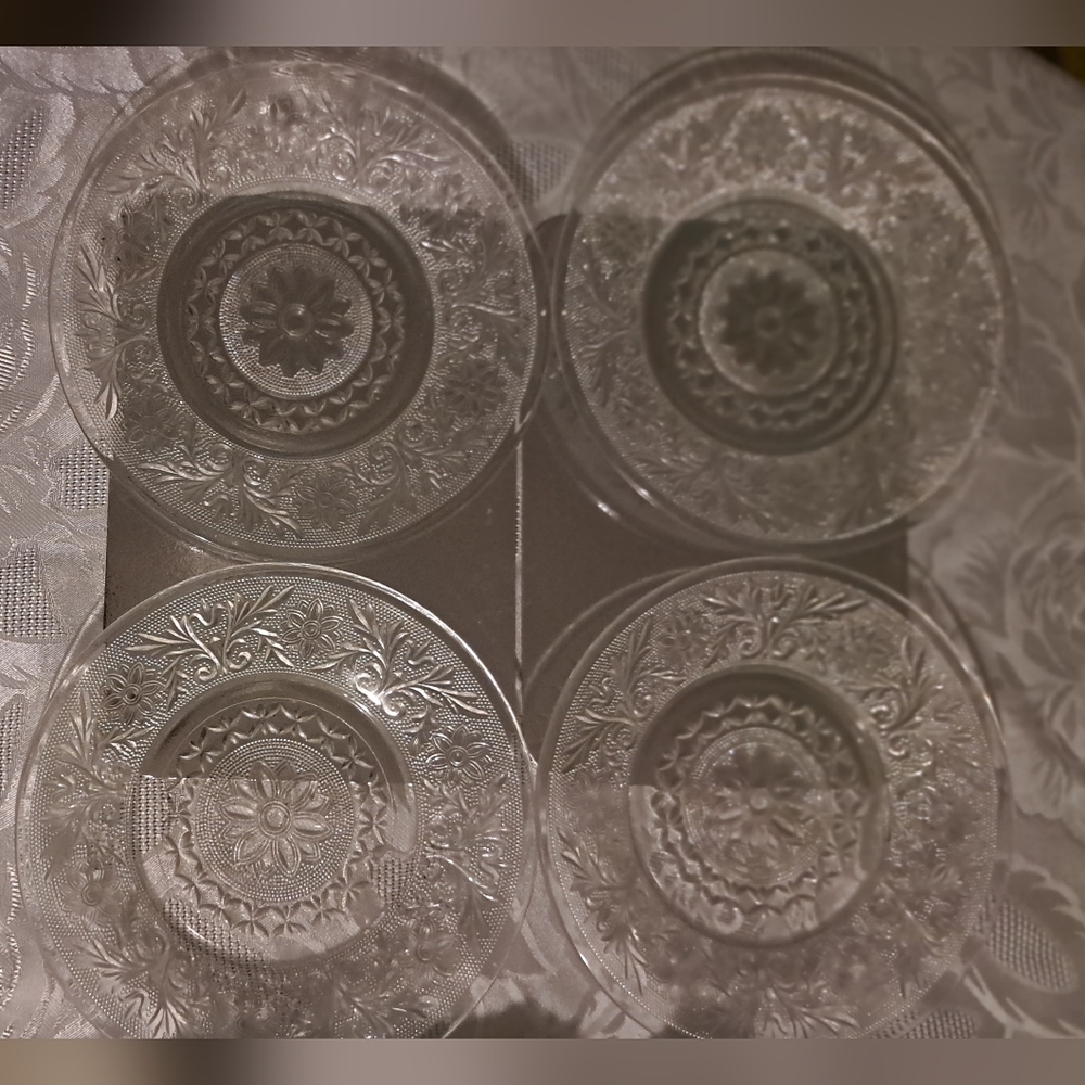 4 bread & butter dishes.